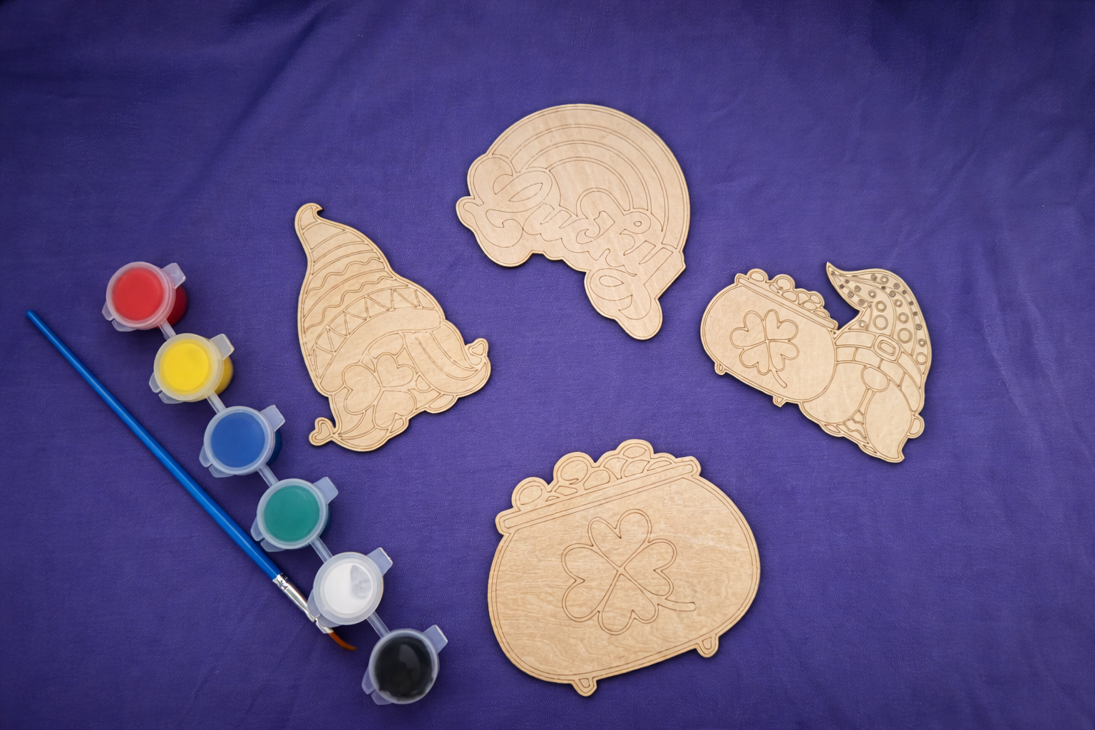 Wooden laser cut pieces for kids to paint.