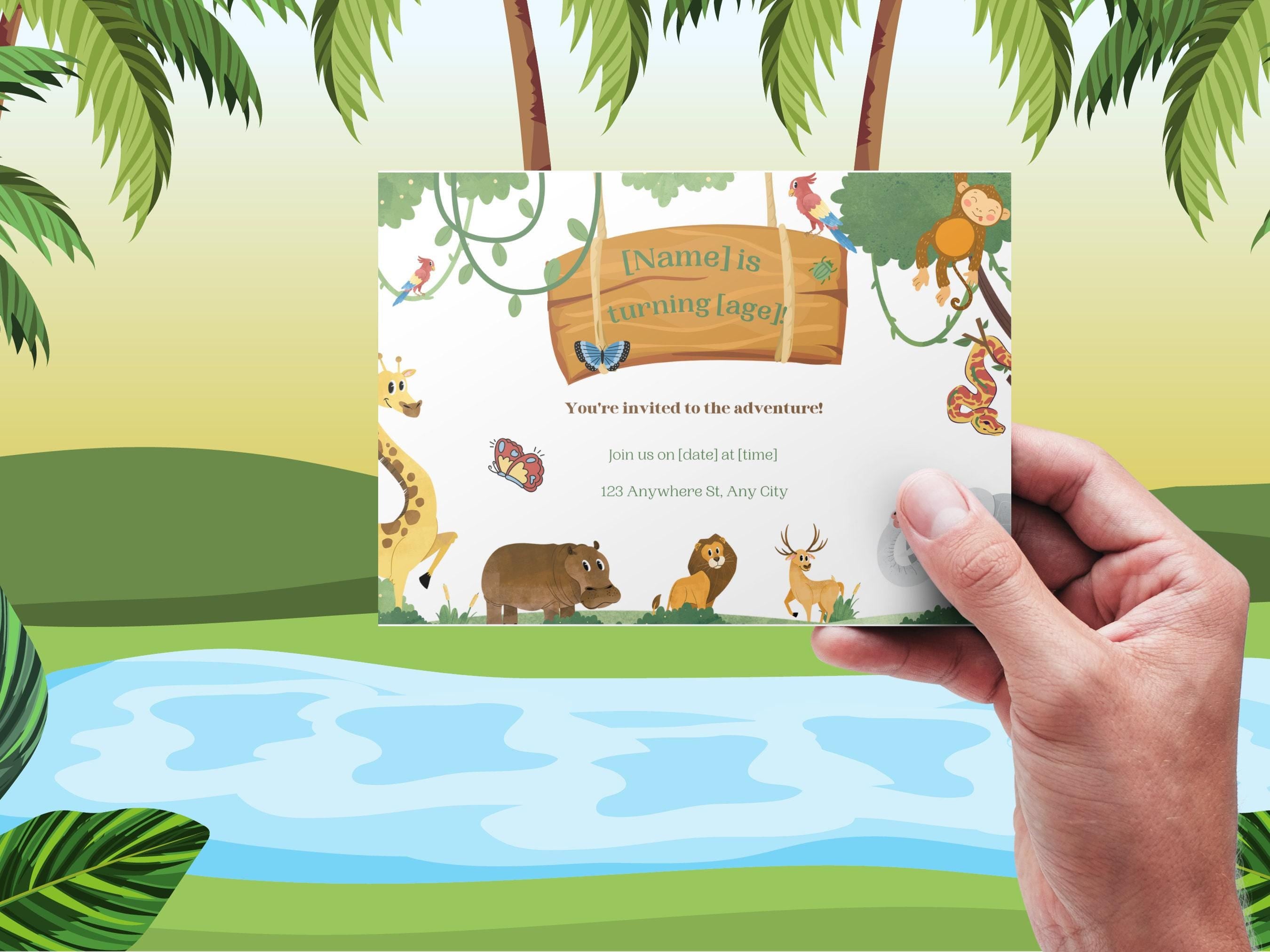 Hand holding a jungle-themed birthday invitation card with cartoon animals on a green landscape background.